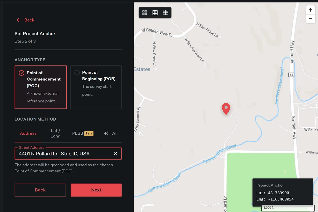The address tab with a geocoded address selected and the anchor map recentered on the parcel, showing the crosshair, scale bar, and live coordinate readout