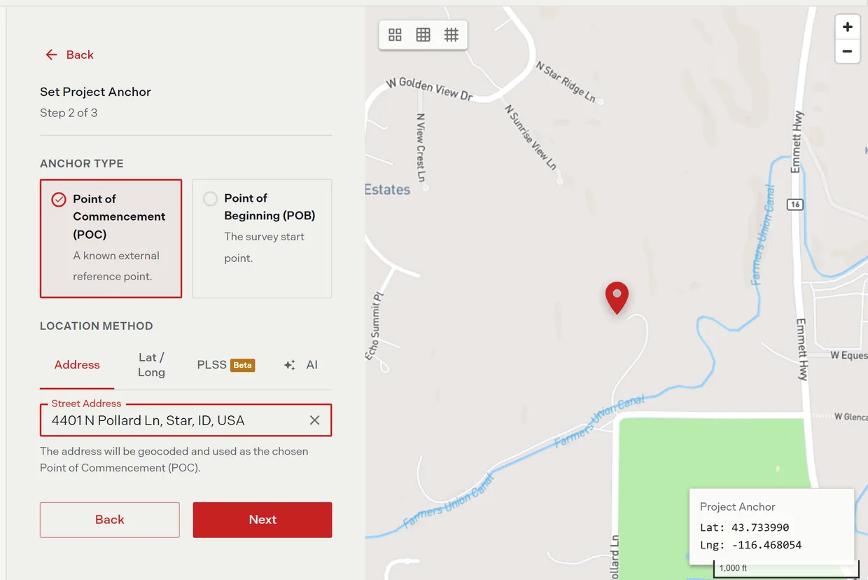 The address tab with a geocoded address selected and the anchor map recentered on the parcel, showing the crosshair, scale bar, and live coordinate readout