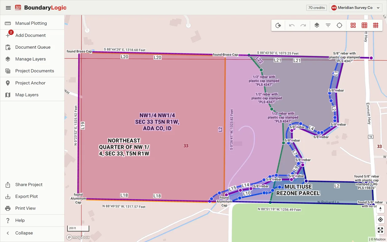 A plotted boundary standing on its PLSS corner on the map with the township, section and quarter grids drawn